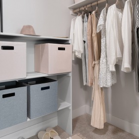 Closet Large well lit closet with custom shelving